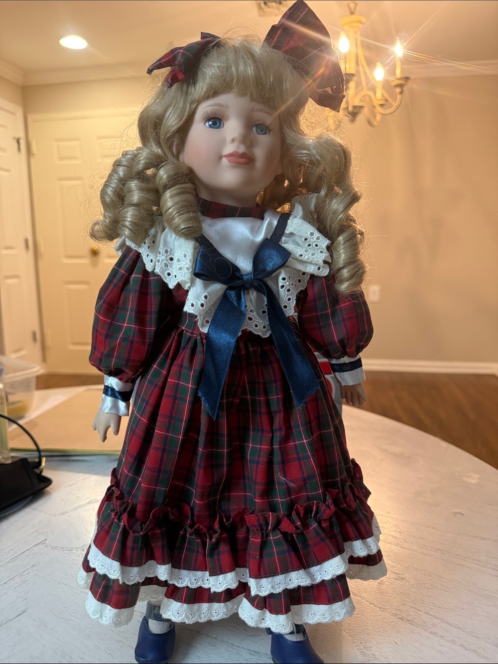 Porcelain Doll in Red Plaid Dress with Navy Bow Accents